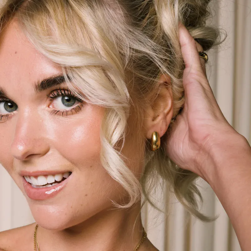 Frida Leonore Dew studs i forgylt stål